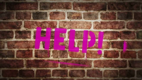Help sign spray painted on the brick wall 스톡 동영상 151141629