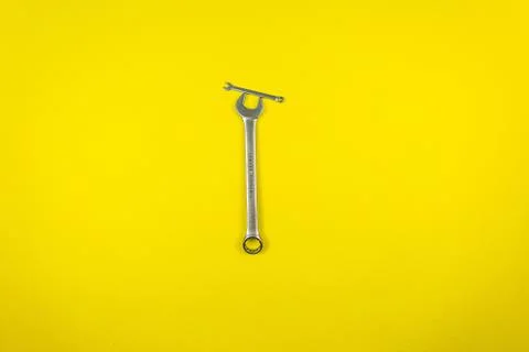 Help for small businesses using wrenches as an example. Support Stock Photos