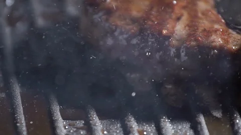 With the help of spatula, the cutlet is grilled, pressed harder to the hot Video stock 115776166