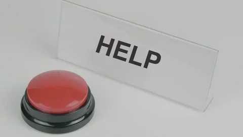 Help text or word displayed on a nameplate as a hand presses a red button Stock Footage 307194779