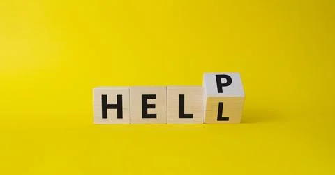 Help vs Hell symbol. Turned wooden cubes with words Hell and Help. Beautiful  Stock Photos