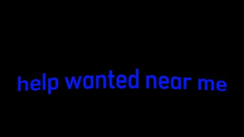 Help wanted animated text on black background Stock Footage 320301049