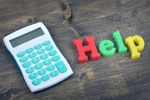 Help on wooden table Stock Photos