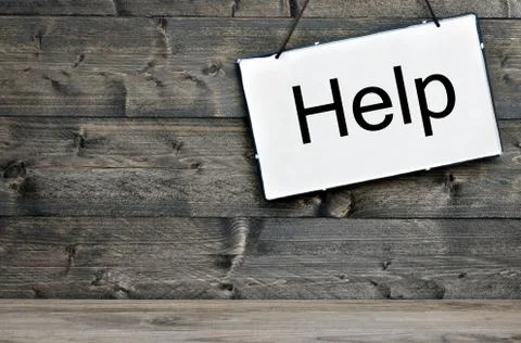Help on wooden table Stock Photos