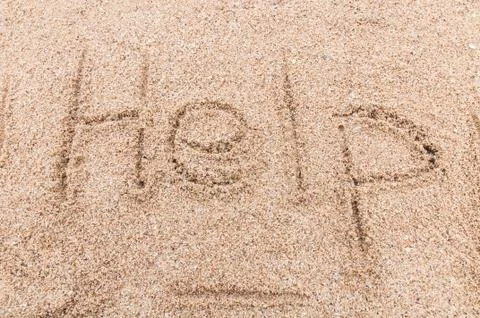 Help! write sand 스톡 사진