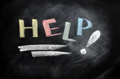 Help written with chalk Stock Photos