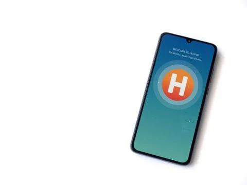 Helpers app launch screen with logo on the display of a black mobile smartpho Stock Photos