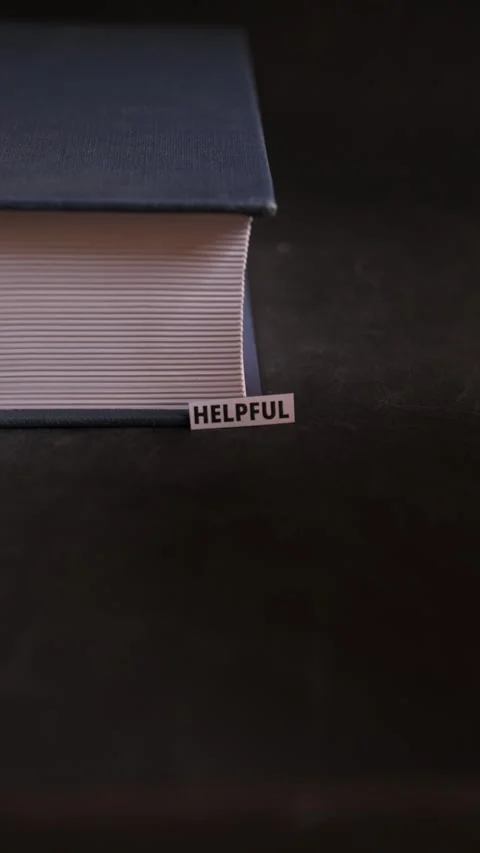 Helpful Paper Label Beside Book Representing Support and Kindness Stock Footage 338345222