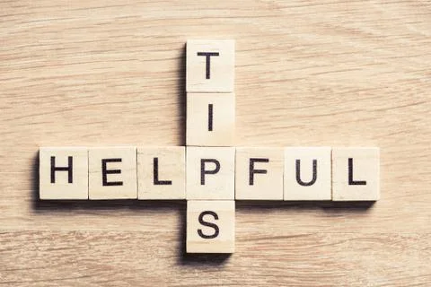 Helpful tips concept on business workplace collected of woodens elements Stock Photos