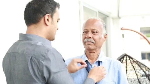 Helping dad tie a tie Video stock 88425508