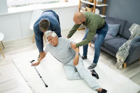 Helping Elder Senior Fallen Man Stock Photos