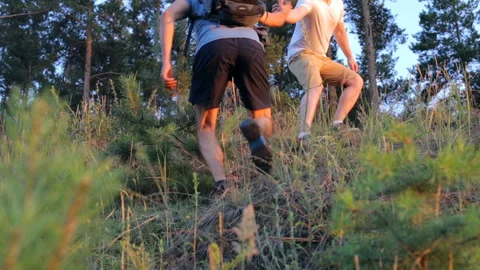 Helping hand in the highlands Stock Footage 100989149