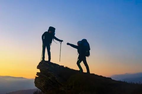 Helping hand on the top. Stock Photos