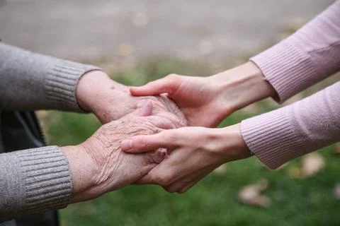 Helping hands. The concept of care for the elderly Stock Photos