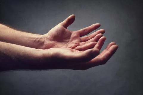 Helping hands or begging for help Stock Photos