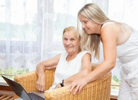 Helping out with new technology Stock Photos