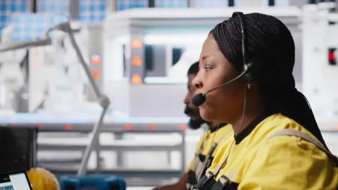 Helpline assistant troubleshoots errors in solar production systems Stock Footage 309069405