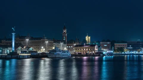 Helsingborg Skyline Reflections on Calm Water at Night Stock Footage 342682070