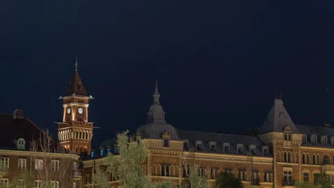 Helsingborg Town Hall Clock Tower Under Stars at Night Stock Footage 342670011
