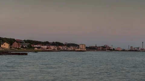 Helsingborg Waterfront Skyline Across Calm Water at Dusk Stock Footage 344083331