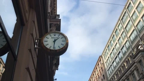 Helsinki, Finland, A clock hanging from the side of a building Stock Footage 134560308