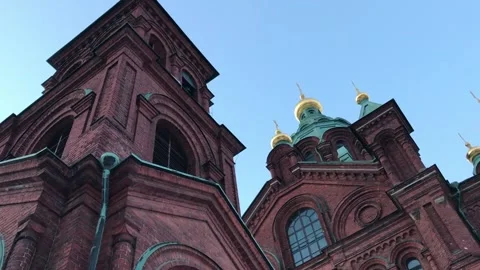 Helsinki, Finland, A clock tower in front of a brick building Stock Footage 134546702