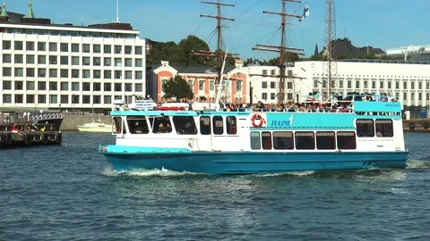 Helsinki, Finland. Small pleasure boat sails to the pier. Stock Footage 105052953