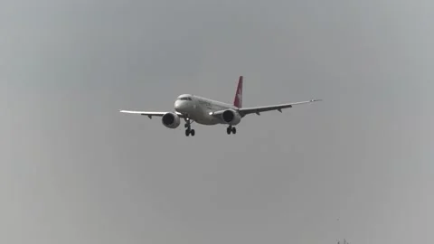 Helvetic Airways, Embraer E190-E2 landing at Bologna G.Marconi Airport Stock Footage 248771811
