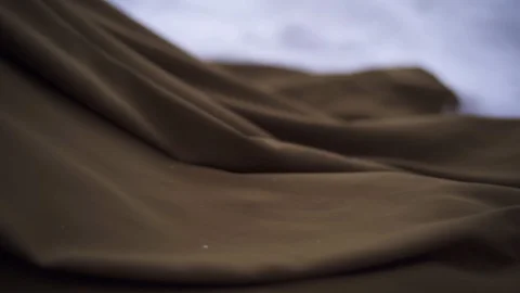 The hem of the cloak glides in the snow Stock Footage 128197402