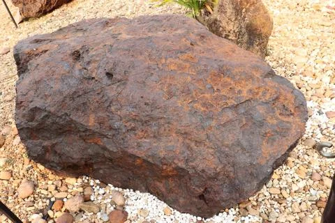 Hematite stone on ground Stock Photos