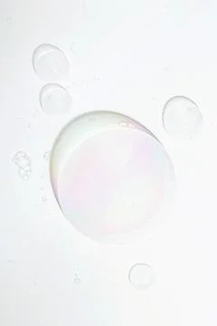 A hemisphere of a transparent soap bubbles on white background. Mockup for the Stock Photos