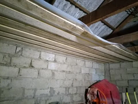 Hemming the ceiling with boards. Stock Photos