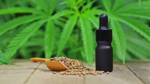 Hemp oil, Marijuana oil bottle, cannabis oil extracts in jars. Stock Footage