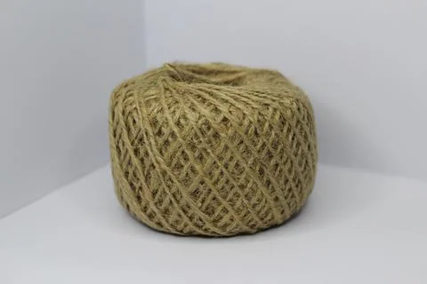 Hemp rope ball on angular isolated background Stock Photos