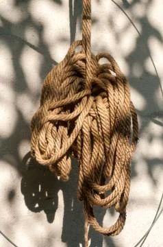 Hemp rope hung on wall Stock Photos