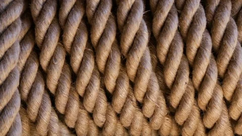 The hemp rope is wound in a roll, close up, daylight Stock Footage 82373248