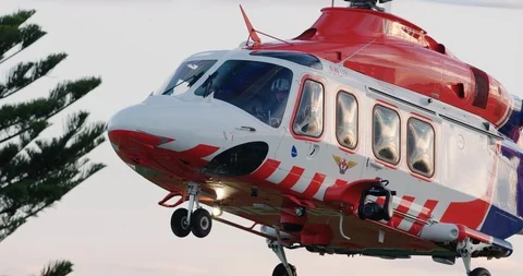 HEMS Helicopter Ambulance lifting off. Stock Footage 87637824