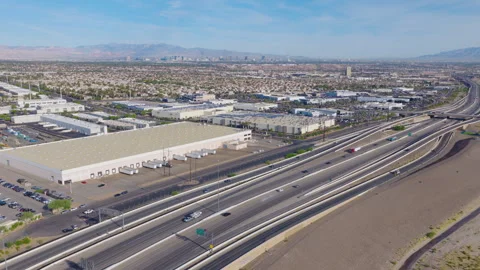 Henderson Nevada Aerial Pullback View of Freeway and Industrial Warehouses 01 Stock-Footage 333934798