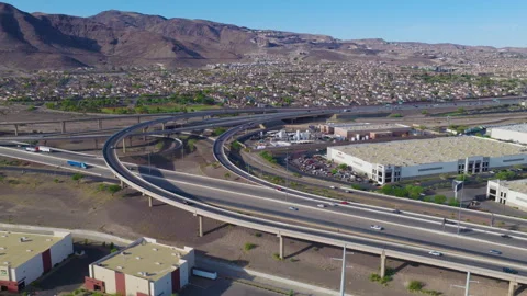 Henderson Nevada Aerial Pullback View of Freeway Interchange and Desert Suburbs Stock-Footage 333934899