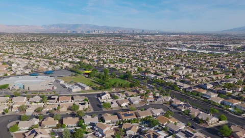 Henderson Nevada Aerial Pullback View of Suburban Homes and Las Vegas Skyline 01 Stock-Footage 333936397