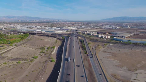 Henderson Nevada Pullback Aerial of Freeway Interchange and Las Vegas Skyline 01 Stock-Footage 333933640
