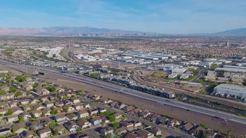 Henderson Nevada Pullback Aerial View of Freeway, Warehouses and Vegas Skyline Stock-Footage 333933741