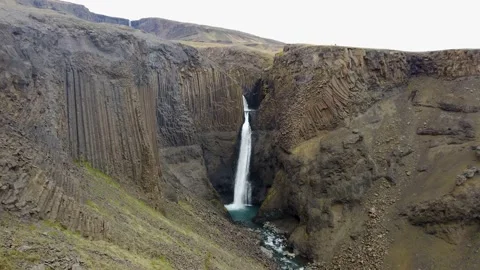Hengifoss waterfall with basalt column formations, Egilsstadir, Iceland Stock Footage 145932694