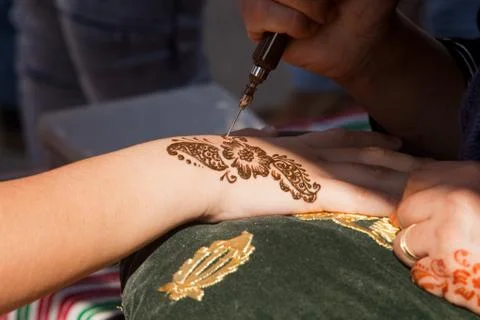 Henna being applied Stock Photos