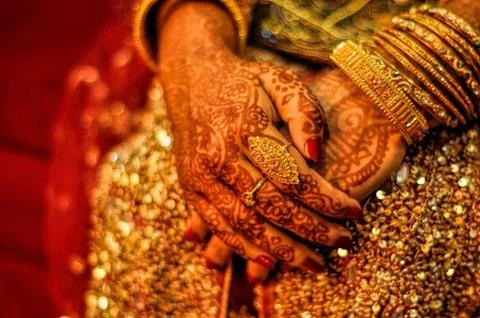 Henna on brides hands Stock Photos