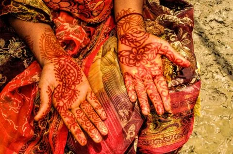 Henna on brides hands Stock Photos