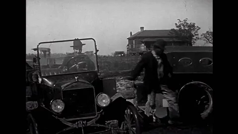 Henry Ford - men help a car out of a pothole 스톡 동영상 235822629