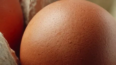 Hens egg extreme macro close up with a rotating camera motion stock footage Stock Footage 328702419