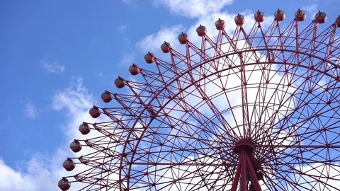 HEP Five ferris wheel is seen over blue sky near Hankyu Stock Footage 98992216