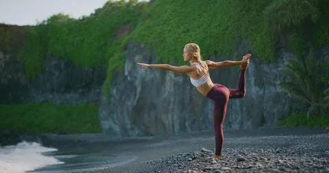 In her beach yoga flow Stock Footage 108175631